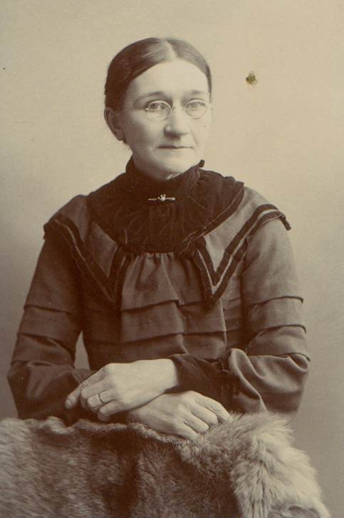 A person posing for the camera

Description automatically generated